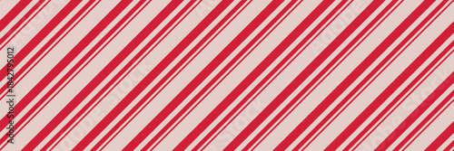 Candy cane Christmas background, peppermint diagonal stripes print seamless pattern, classic holiday motif with bold seasonal colors, ideal for textiles, gift packaging, greeting cards,