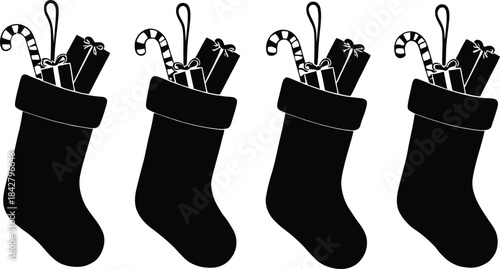 Monochrome Vector Illustration of Festive Christmas Stockings Depicted in Minimalist Silhouettes Featuring Candy Canes and Wrapped Gifts to Represent Holiday Cheer, Seasonal Tradition, and Decorative 