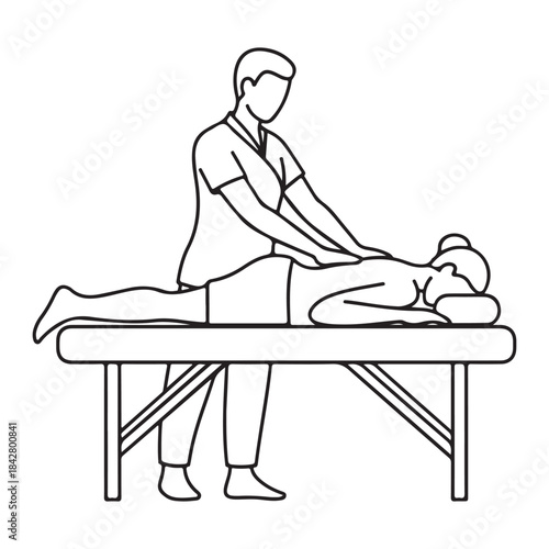 Therapist performing back massage on a client lying on a massage table