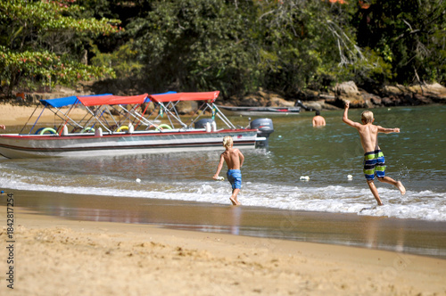 children playing on the beach