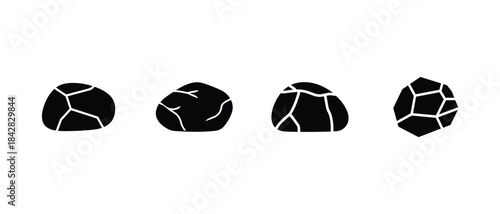 Black cracked stones isolated on white background