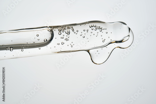 Serum cosmetic pipette dropper with liquid and bubbles