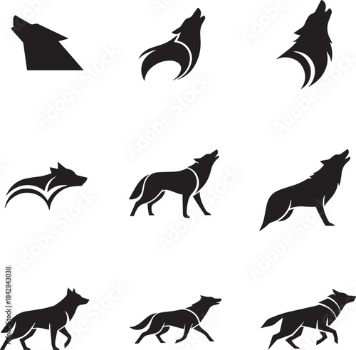 Gray wolf standing alone in a snowy forest landscape