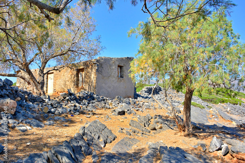 Ruined old house near Elounda town on the island of Crete in Greece