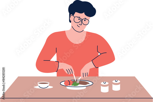 A man is eating a meal at a table