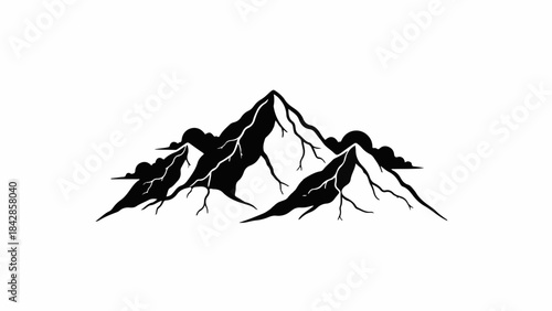 Majestic snow-capped mountain peaks under a cloudy sky, symbolizing nature's grandeur and adventure.