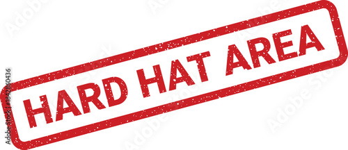 Distressed red rubber stamp with textured border indicating a hard hat area safety notice for construction sites