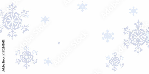 Delicate blue snowflakes gently falling on a clean white background