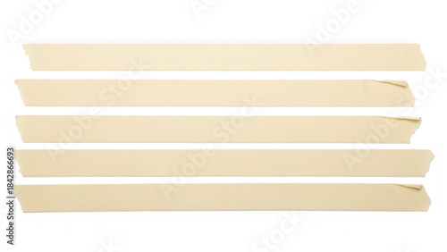 Five strips of beige masking tape lying flat on a black background