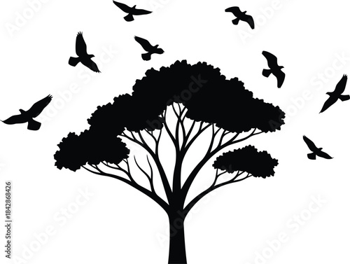 Silhouette of a lone tree with birds taking flight creating a sense of freedom and movement isolated on white background