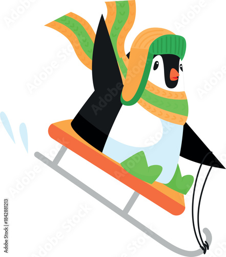 A penguin is sliding down a snow-covered slope wearing a green hat and scarf