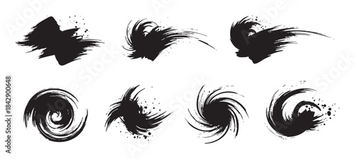 Black ink brush strokes set featuring various artistic grunge elements and dynamic textured paint splatters suitable for creative design projects.