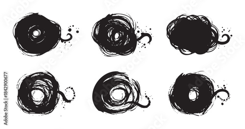 Black ink grunge brush strokes create a set of six abstract circular shapes with artistic splatter details and dynamic swirling patterns.