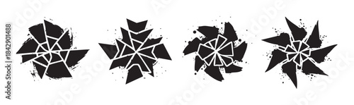Abstract shattered grunge geometric symbols with a distressed, artistic appearance, featuring sharp fragments and ink splatters for a dynamic design.