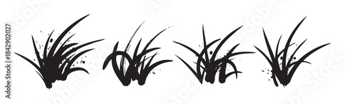 Black ink brush stroke grass elements with dynamic splatters create a versatile and artistic natural design, perfect for various creative projects.