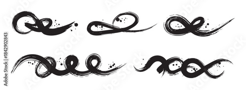 Collection of black ink brush strokes with grunge texture and splatters forms a versatile set of artistic decorative elements and dividers.