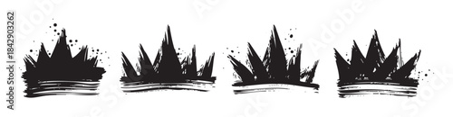 Four grunge style crowns drawn with rough brushstrokes, creating a collection of artistic royal symbols with an edgy, hand-painted aesthetic.