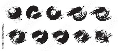 Abstract black ink brush strokes collection with grunge texture and artistic splatters creating a dynamic and expressive design element set.