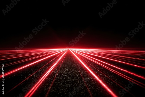 High-speed light trails create a striking visual effect in urban setting during nighttime hours