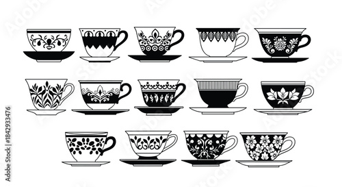 Collection of decorative black and white teacups featuring intricate floral and geometric patterns arranged in three rows for a classic tableware display.