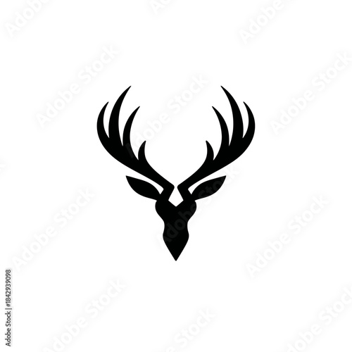 Sleek black deer head silhouette with majestic antlers. Modern geometric wildlife design for logo, emblem, or icon on white.