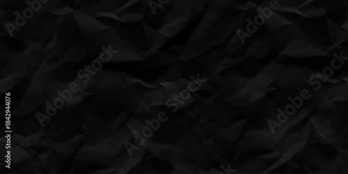 crumpled torn and old black paper. black and white background