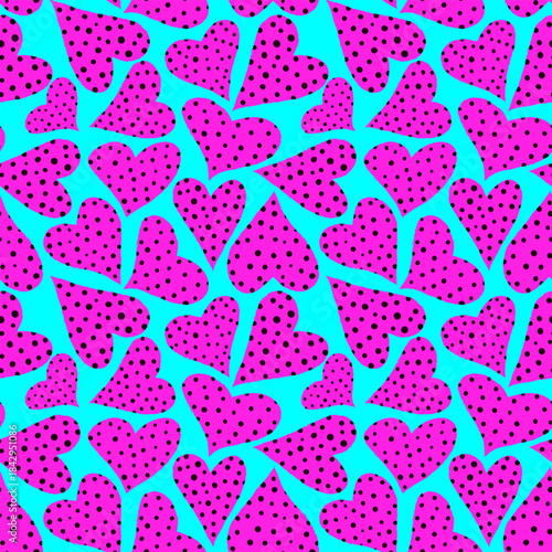 bright seamless pattern with pink polka dot hearts on neon blue background modern abstract texture wallpaper design for valentine day