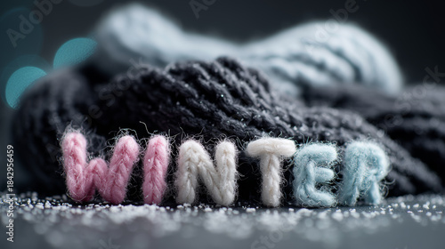 The word Winter is made of woolen knitted letters in different colors, a cute themed inscription, yarn and knitting, a season for warm scarves and sweaters