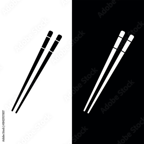 Minimalist black and white chopsticks design isolated on a clean background perfect for Asianthemed graphics and branding projects