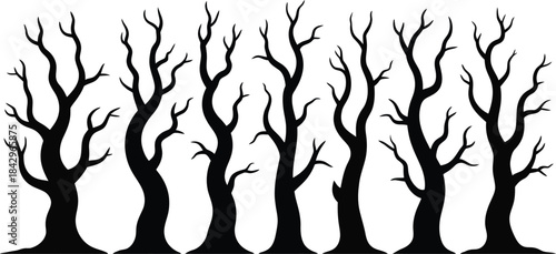 Black silhouette of bare trees on white background