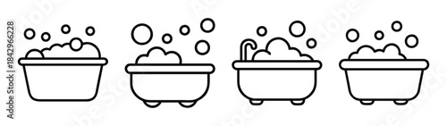 A set of four linear icons depicting bathtubs and basins filled with soap bubbles Vector