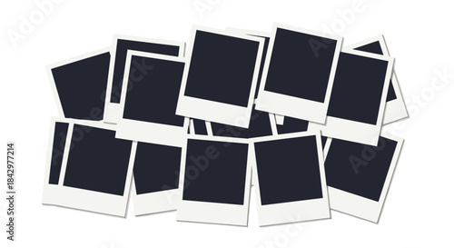 A pile of blank polaroid photos.