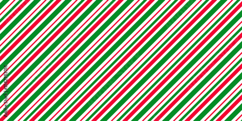 Candy cane pattern. Seamless red and green striped lollipop background. Vector illustration of Geometric diagonal line pattern for winter gift wrapping paper 