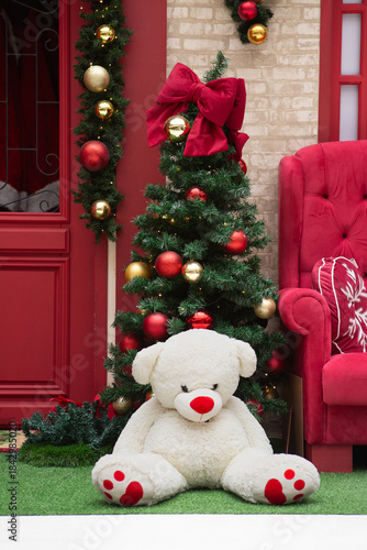 Christmas Decoration Scene with Teddy Bear and Festive Tree