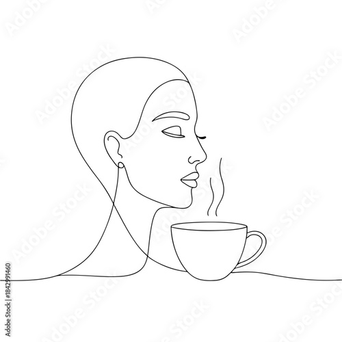 Woman enjoying a warm beverage while relaxing at home  