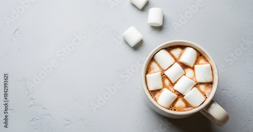 Cozy Hot Chocolate with Marshmallows on Grey Background Overhead Still Life