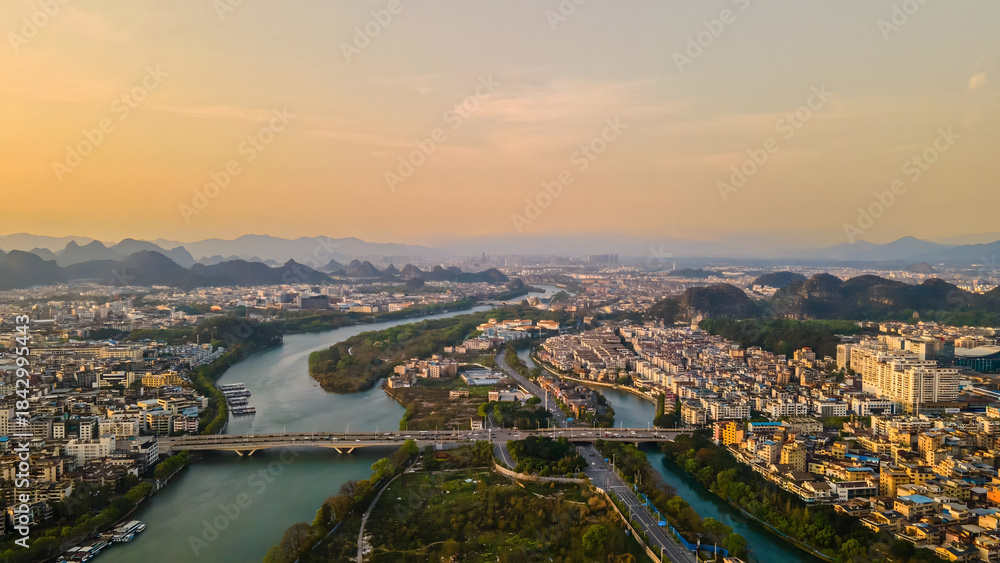 Fototapeta premium Guilin Golden Hour Aerial View - Karst Mountains and Rivers