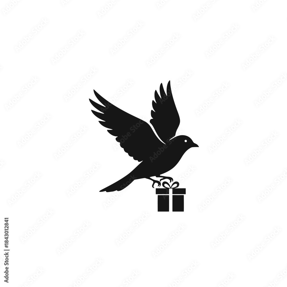 Obraz premium A black silhouette of a bird in flight carrying a small gift box.