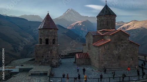 The Church of the Holy Trinity (Gergeti) with a view of Mount Kazbek, in the village of Stepantsminda, Georgia
