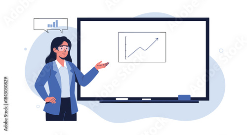Confident female presenter wearing a blue blazer stands beside a large screen presenting a rising chart to illustrate growth during a business training session.