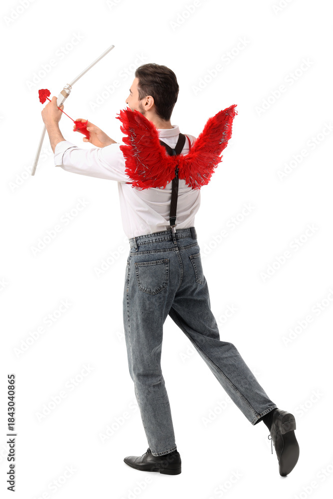 Obraz premium Man dressed as Cupid with bow and arrow on white background. Valentine's Day celebration