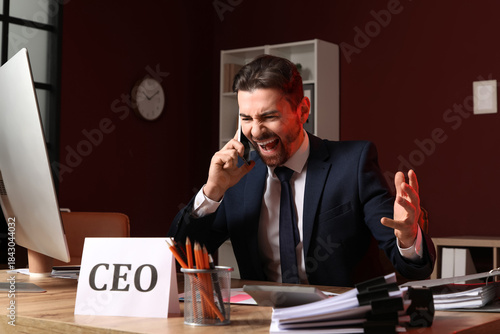 Angry businessman shouting ...