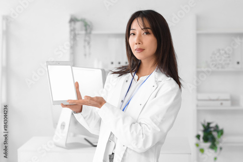 Female Asian scientist with...