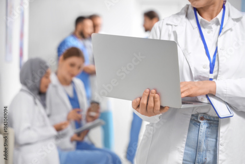 Female doctor working with ...