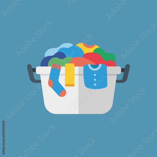 Laundry basket filled with colorful clothes and a sock hanging over the side.