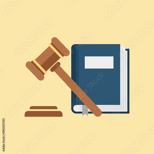 Gavel rests next to a blue book with a gray bookmark.