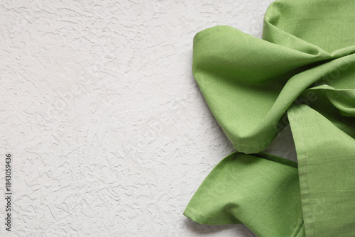 Green napkin on white backg...