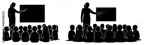 Silhouette of a teacher pointing at a blackboard teaching a group of students