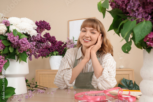 Female florist with beautif...