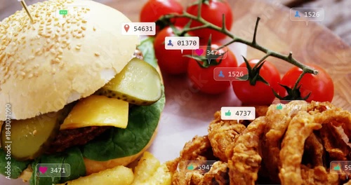 Social badges popping from ping, covering burger, fries, onion rings, representing engagement